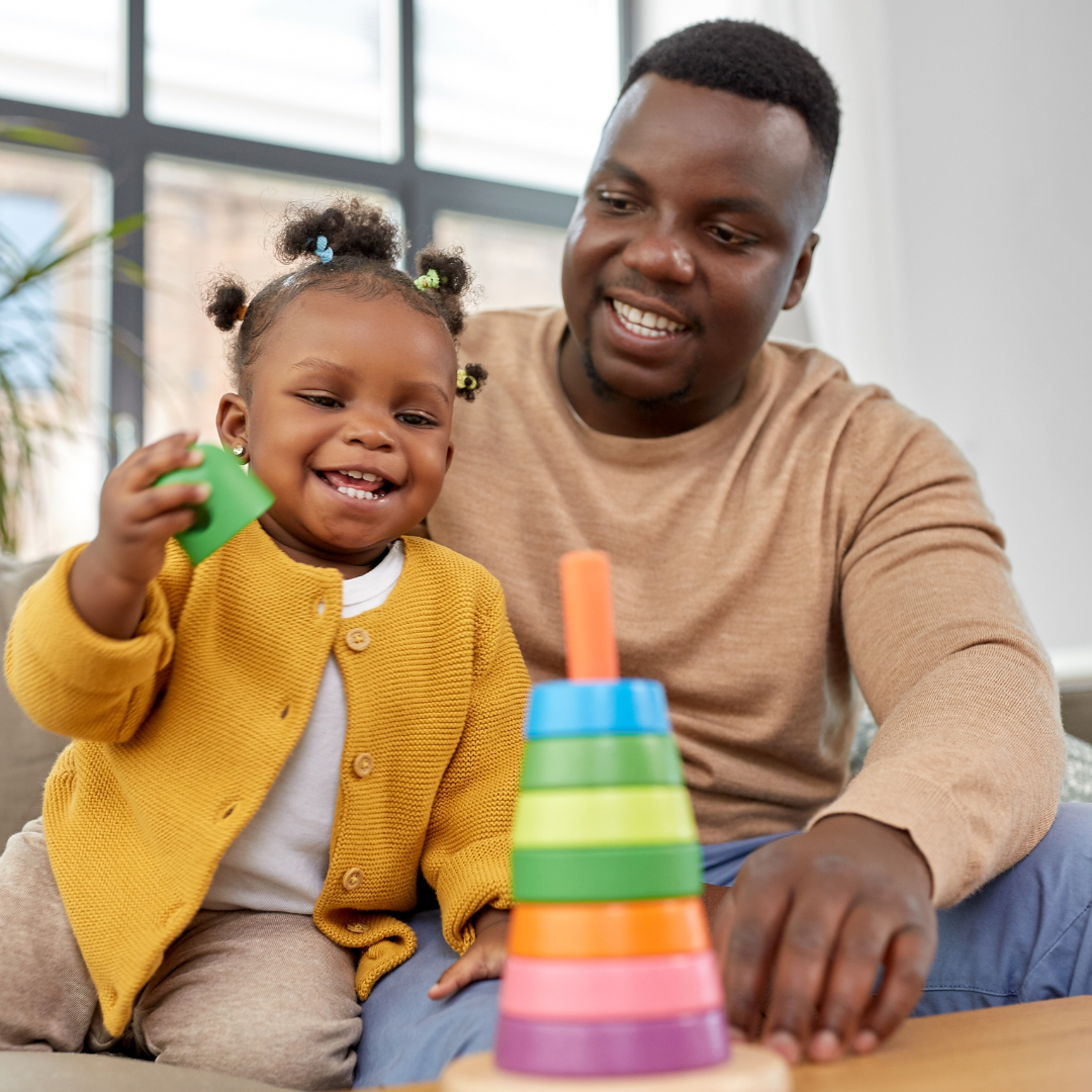 Father and daughter playing — Child First supports the whole family