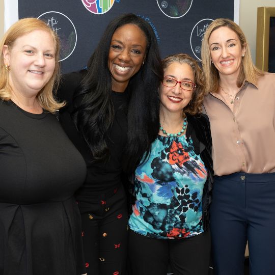 Dr. Burke Harris with staff